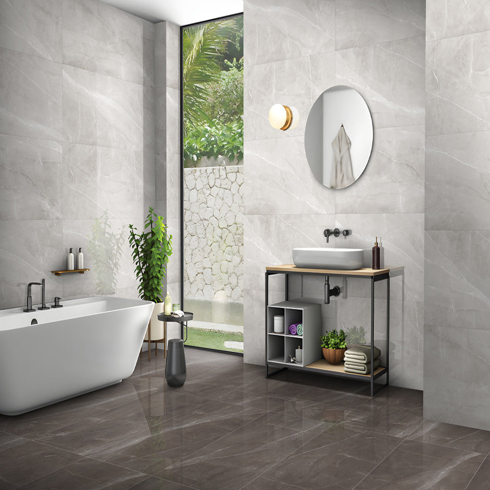 Bathroom floor tiles featuring marble-effect porcelain in a modern en-suite