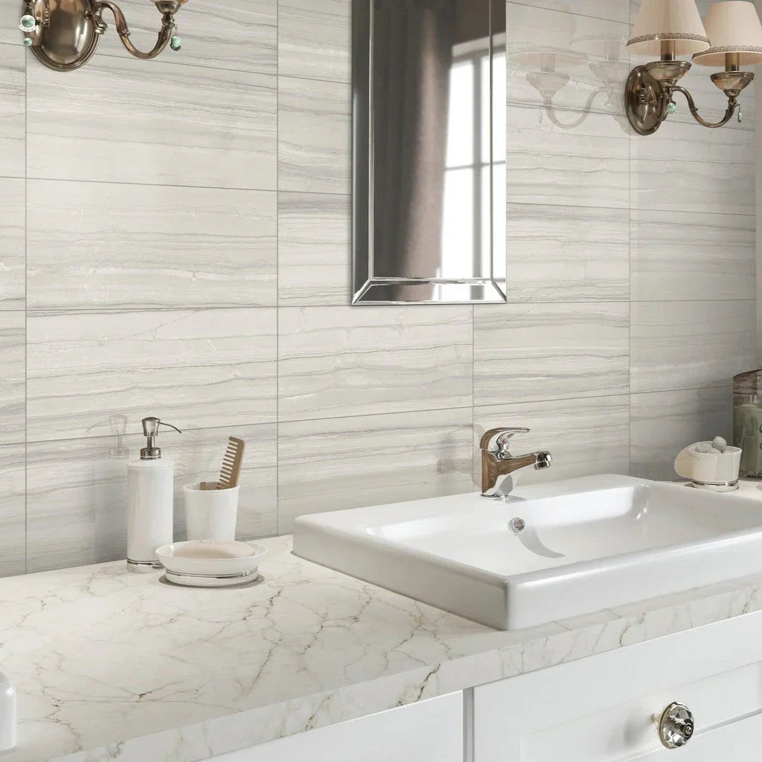 Bathroom tile ideas for small and large spaces — white marble-effect floor tiles