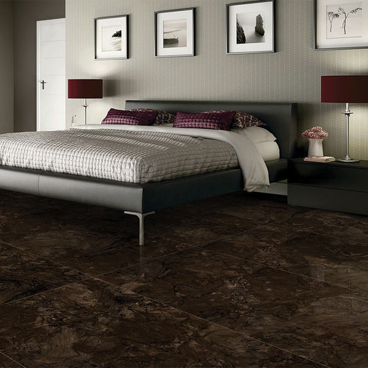 Modern bedroom with a bed, nightstands, and wall art.