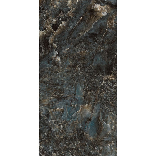 Close-up of a dark, textured stone surface with veins