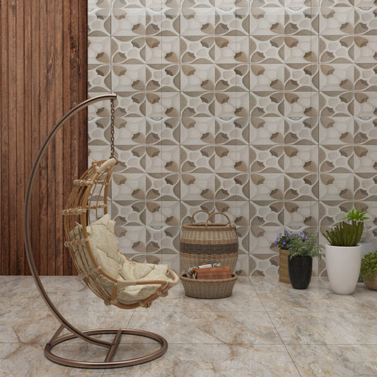 Hanging chair with beige cushion against a patterned tile wall.