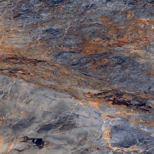 Close-up of a stone surface with gray, brown, and black colors