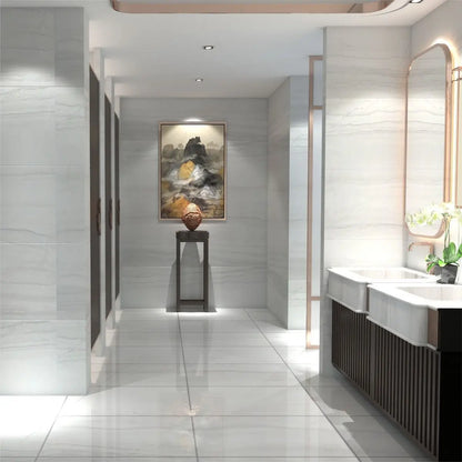 Close up of Demira light grey glossy porcelain floor tile 300x600mm with marble-effect veining for modern bathrooms