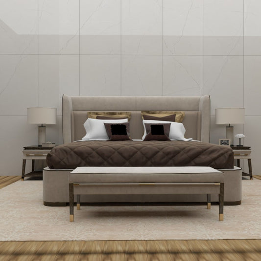 Modern bedroom with a large bed, nightstands, and lamps against a light gray wall.
